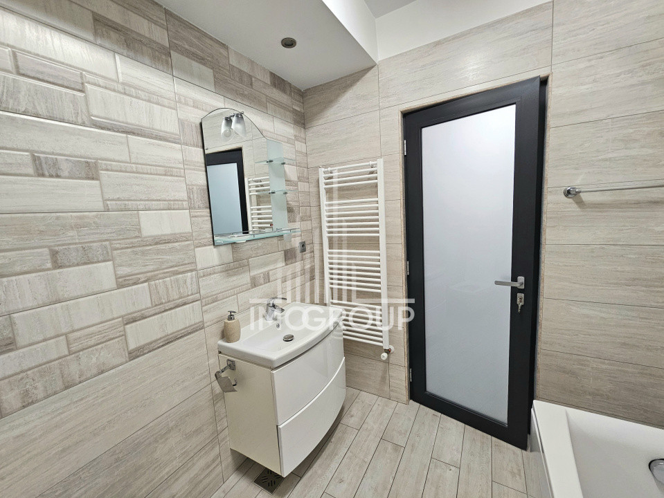 Apartament modern de închiriat 3 camere, 2 băi, 75 mp utili, garaj