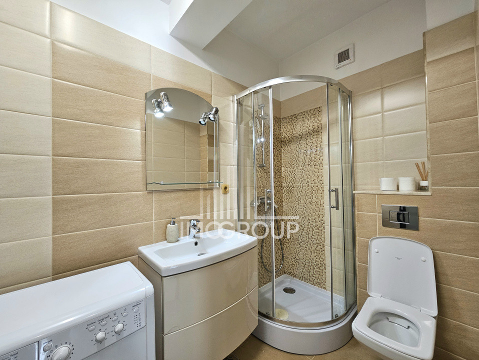 Apartament modern de închiriat 3 camere, 2 băi, 75 mp utili, garaj