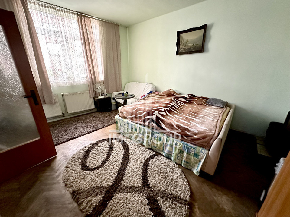 Apartament la curte comuna | cota teren 180mp | zona strazii Traian