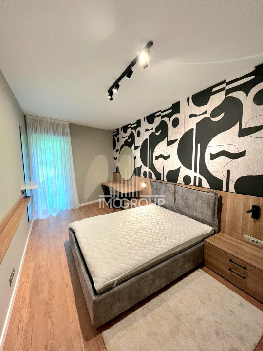 Inchiriez apartament NOU 2 camere cu grădină, garaj prima închiriere