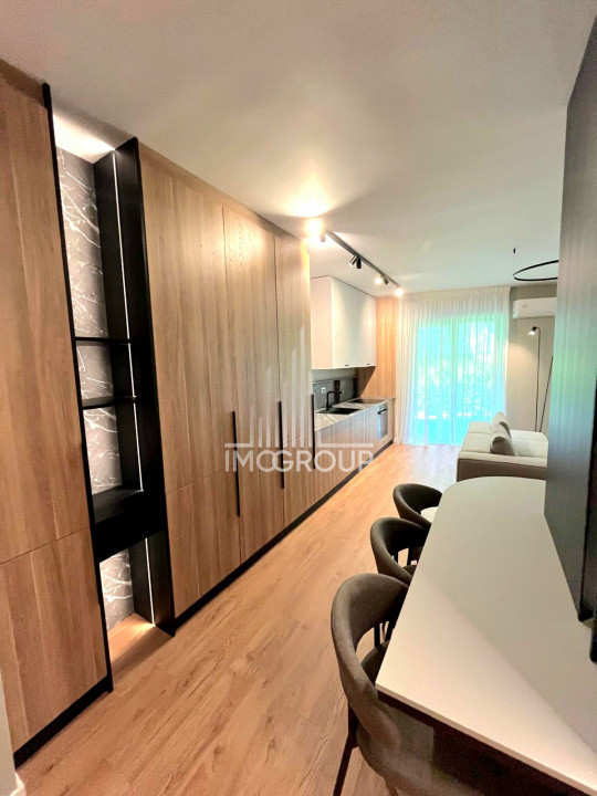 Inchiriez apartament NOU 2 camere cu grădină, garaj prima închiriere