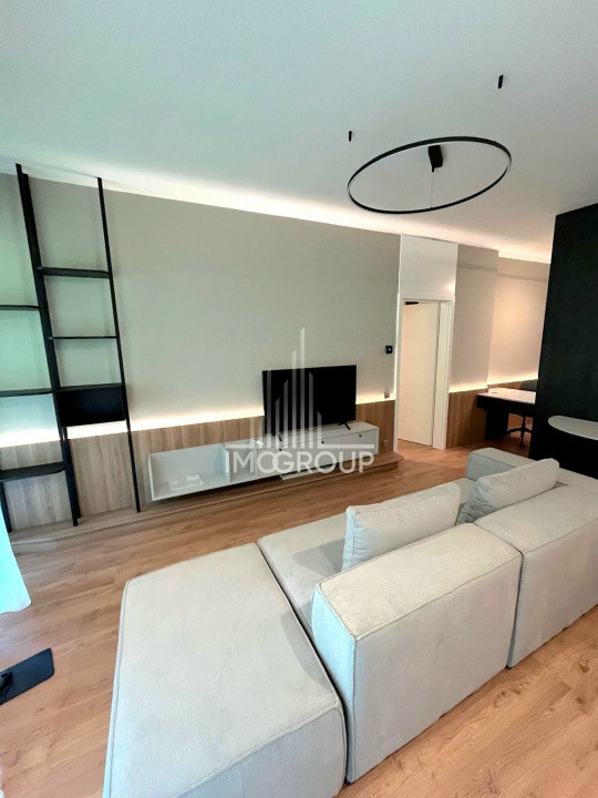 Inchiriez apartament NOU 2 camere cu grădină, garaj prima închiriere