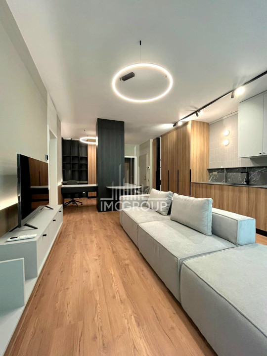 Inchiriez apartament NOU 2 camere cu grădină, garaj prima închiriere