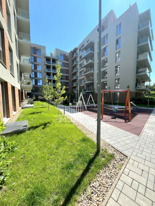 Inchiriez apartament NOU 2 camere cu grădină, garaj prima închiriere