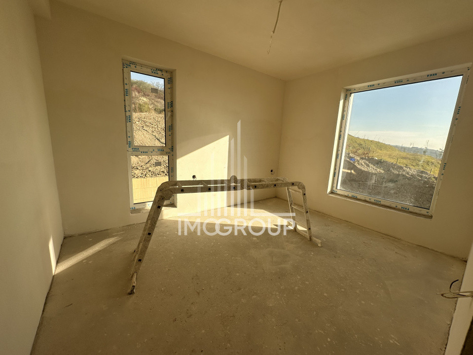 Duplex modern NZEB cu rooftop panoramic și garaj, situat pe o stradă liniștită, 