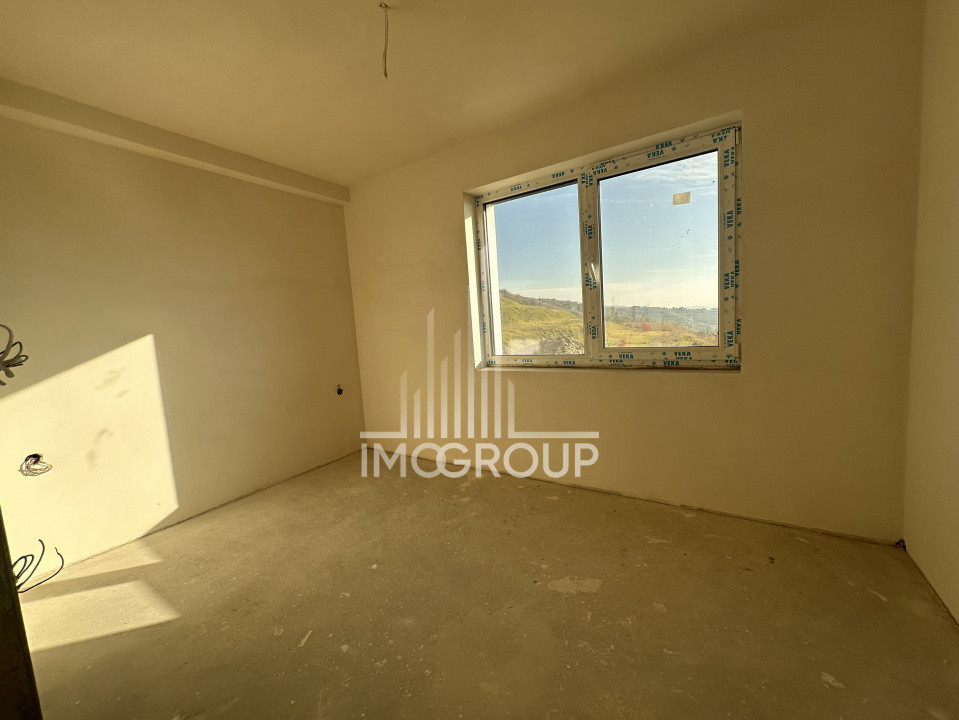 Duplex modern NZEB cu rooftop panoramic și garaj, situat pe o stradă liniștită, 