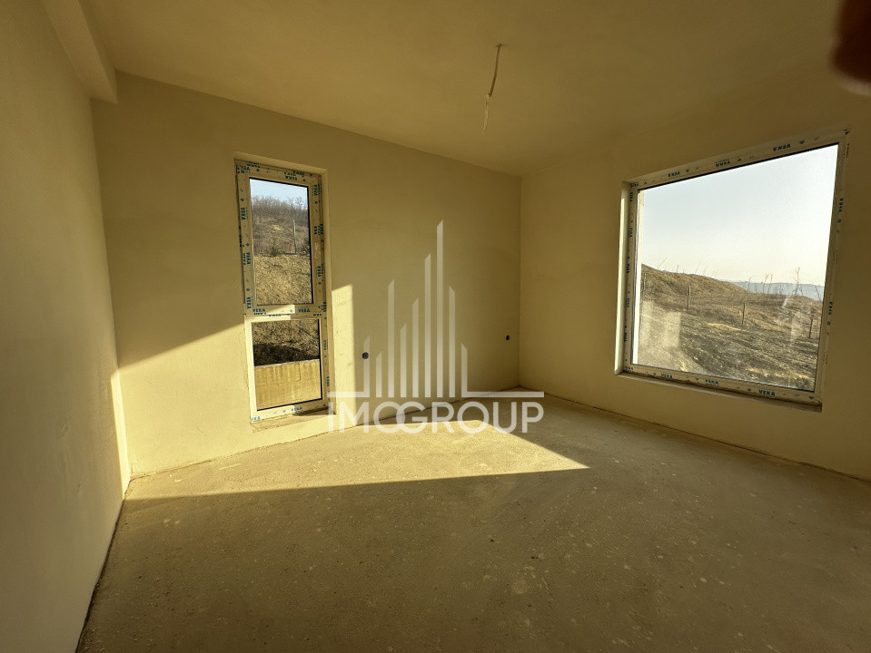 Duplex modern NZEB cu rooftop panoramic și garaj, situat pe o stradă liniștită, 