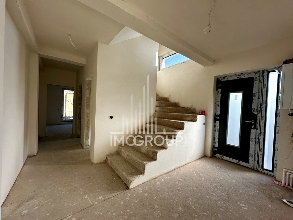 Duplex modern NZEB cu rooftop panoramic și garaj, situat pe o stradă liniștită, 