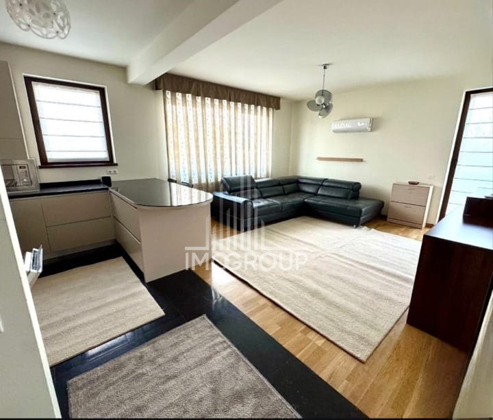 Apartament de inchiriat 2 camere, grădină proprie 110 mp și parcare privată 