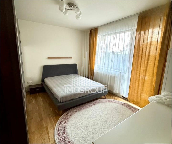 Apartament de inchiriat 2 camere, grădină proprie 110 mp și parcare privată 