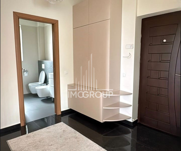 Apartament de inchiriat 2 camere, grădină proprie 110 mp și parcare privată 