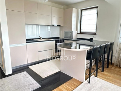 Apartament de inchiriat 2 camere, grădină proprie 110 mp și parcare privată 