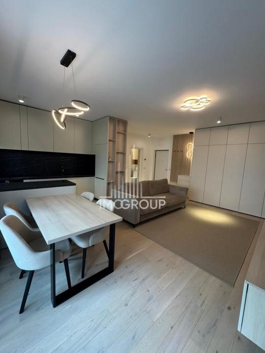 Apartament premium cu grădină privată – de închiriat |  zonă semicentrala