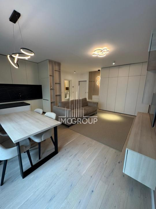 Apartament premium cu grădină privată – de închiriat |  zonă semicentrala