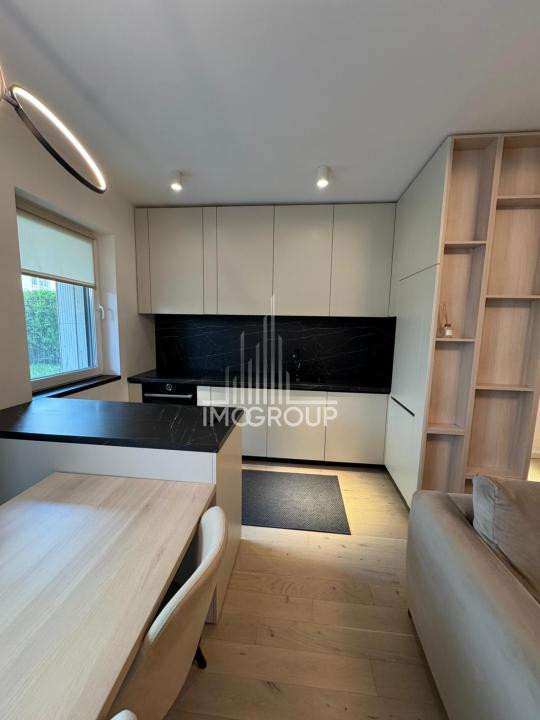 Apartament premium cu grădină privată – de închiriat |  zonă semicentrala