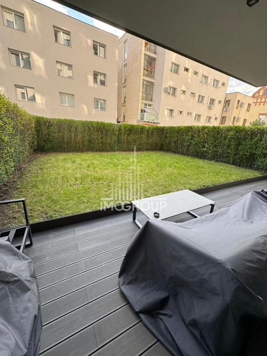 Apartament premium cu grădină privată – de închiriat |  zonă semicentrala